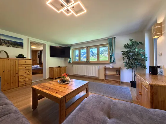 Woonkamer van Appartement 11 met bergzicht
